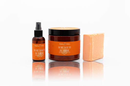 A photo of the serengeti sunrise bundle which includes the fragrance mist, a body butter, and the vegan cleansing bar.